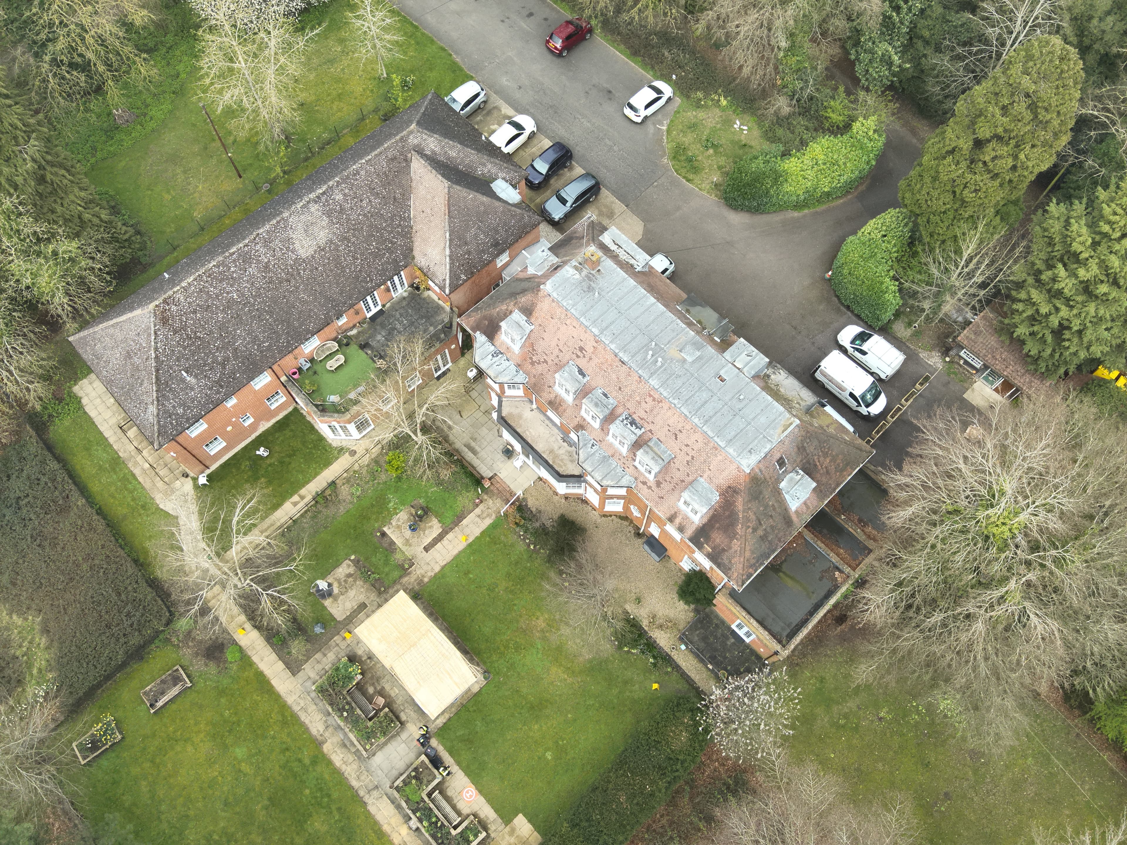 Aerial of heritage care home with gardens, showing the scale and setting of the property